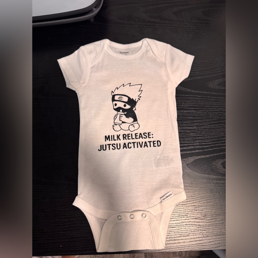 White Gerber custom Baby Onesie “milk release: jutsu activated”